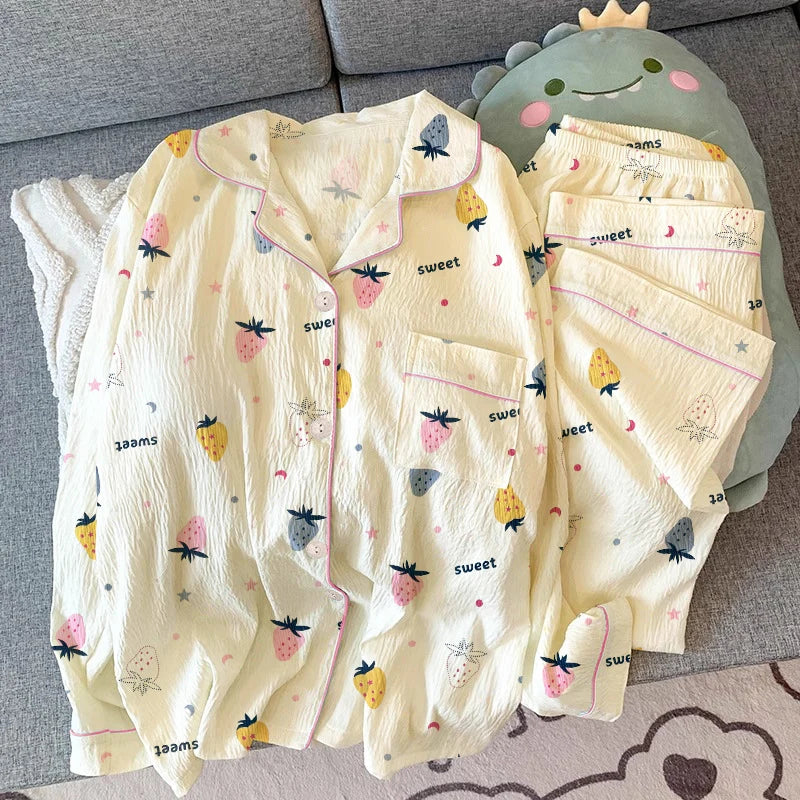 Pijama largo de mujer con diseño de moños y solapas