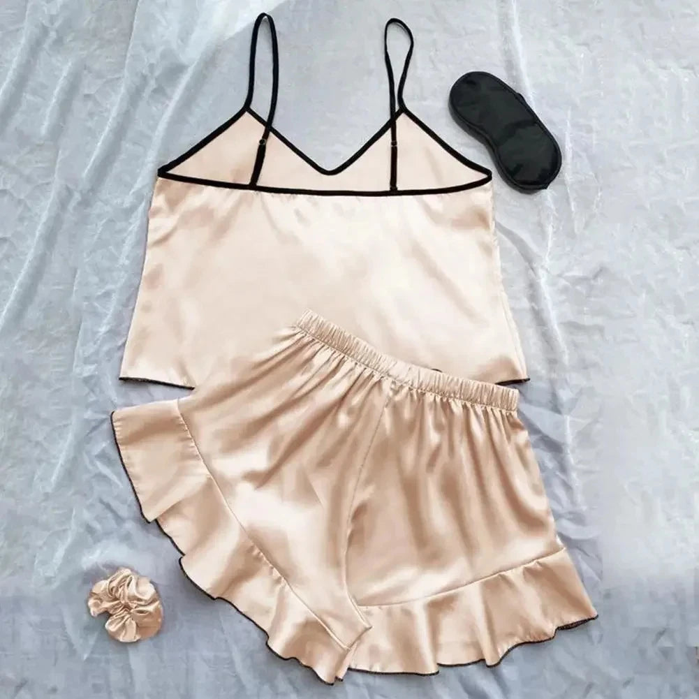 Pijama de mujer satinado con musculosa y short con moño