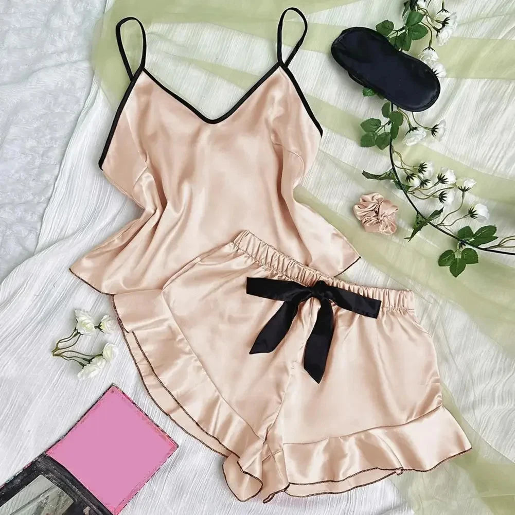 Pijama de mujer satinado con musculosa y short con moño